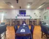 Recreation room featuring tile floors and a paneled ceiling