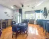 Tiled dining area featuring a drop ceiling