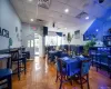 Dining space featuring tile floors and a drop ceiling