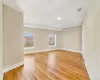 Spare room with plenty of natural light and light hardwood / wood-style floors