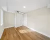 Room with light hardwood / wood-style floors