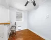 Dining room featuring crown molding, ceiling fan, radiator heating unit, and parquet flooring