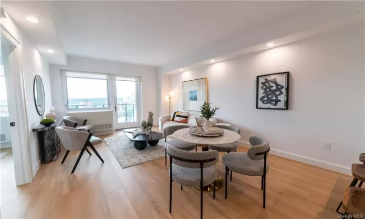 Dining room with light hardwood / wood-style floors