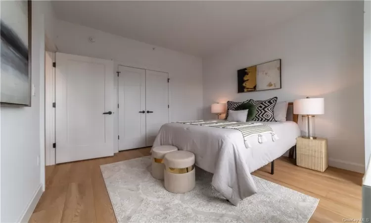 Bedroom featuring light hardwood / wood-style flooring