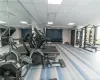 Gym featuring a paneled ceiling