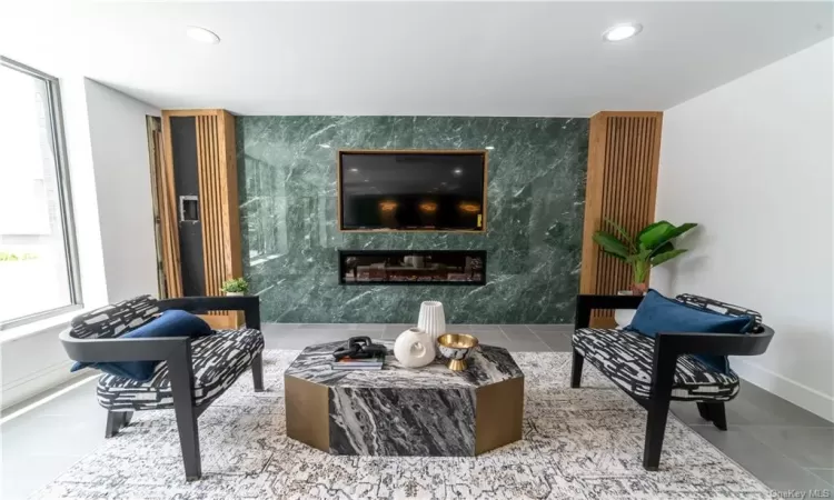 Tiled living room with plenty of natural light