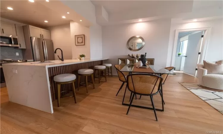 Dining room featuring light hardwood / wood-style flooring