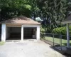 Garage with a lawn