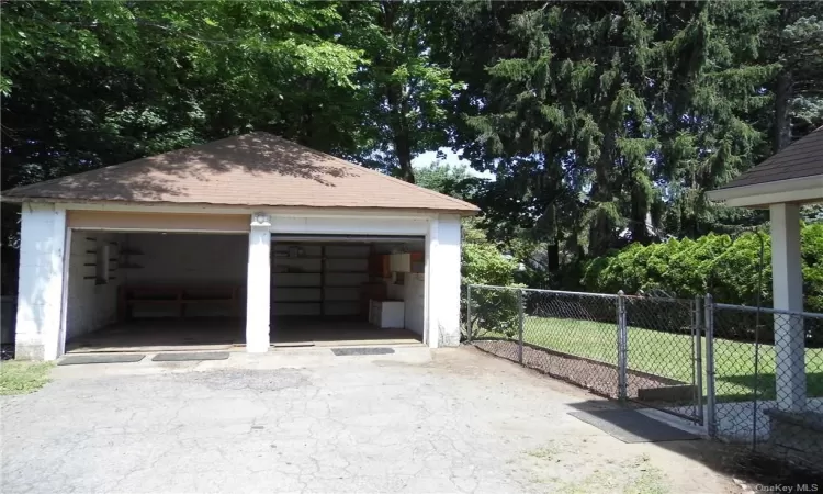 Garage with a lawn