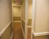 Hallway to office 5 and 6 and rear exit door.