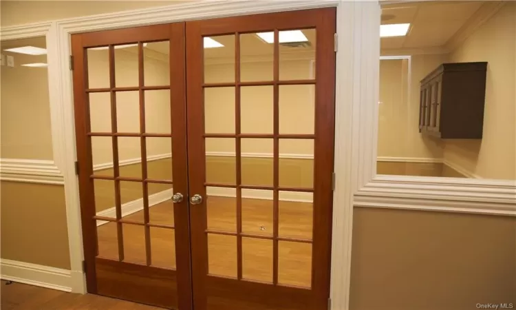 French doors on the conference room for privacy and noise reduction, inside and out.