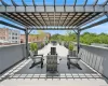 Wooden terrace featuring a pergola