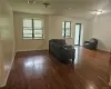 Living room featuring dark hardwood / wood-style floors