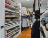 Spacious closet featuring hardwood / wood-style floors