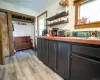 Kitchen with a wealth of natural light and light wood-type flooring