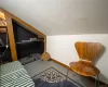 Sitting room featuring lofted ceiling