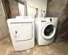 Clothes washing area with hookup for a washing machine and washer and dryer