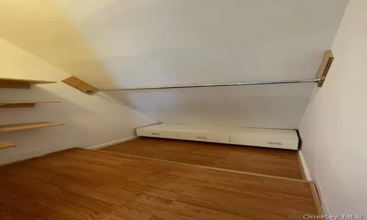 Walk in closet off bedroom