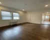 Living room and view into kitchen