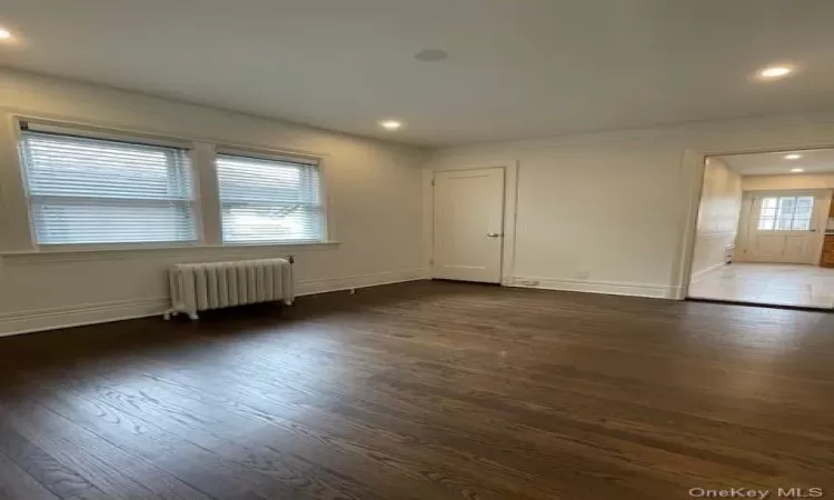 Living room and view into kitchen