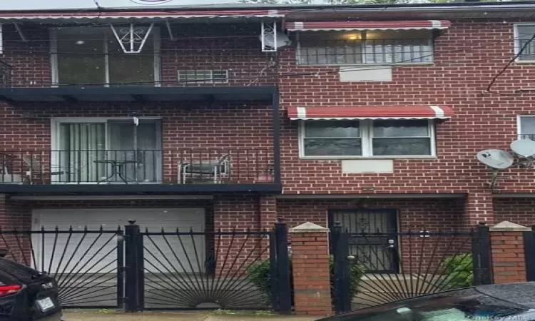 View of property featuring a garage