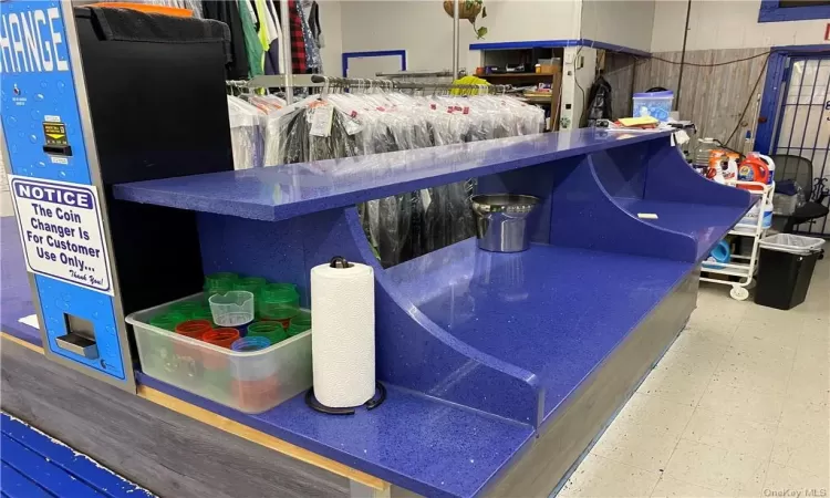 Folding counter and dry cleaner area and coin machine