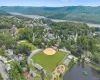 Drone / aerial view of Town Park featuring a water view