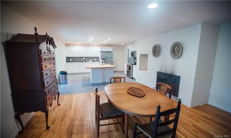 Stairway featuring light hardwood / wood-style flooring