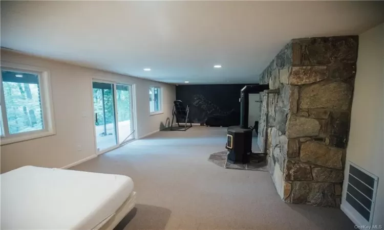 Bathroom featuring vanity, tile floors, and plus walk in shower