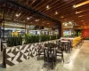 Dining room featuring indoor bar and concrete flooring