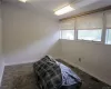 Bedroom featuring multiple windows