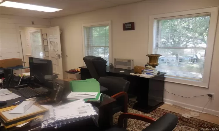 Office area with wood-type flooring