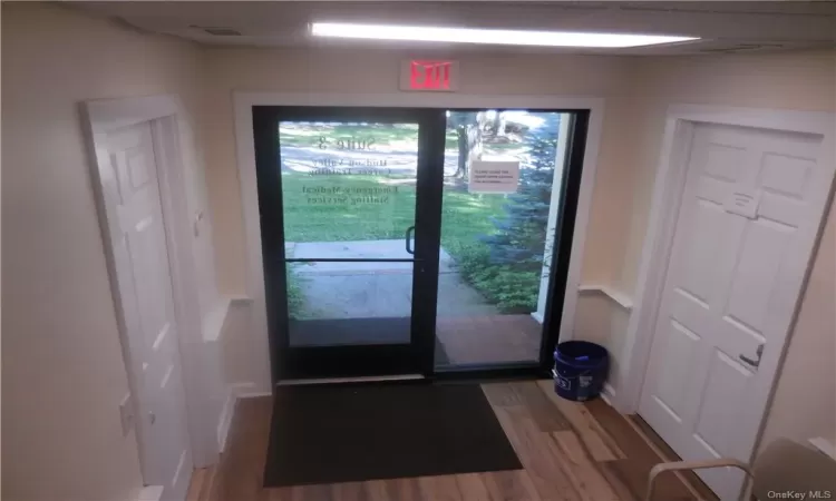 Foyer featuring hardwood / wood-style flooring