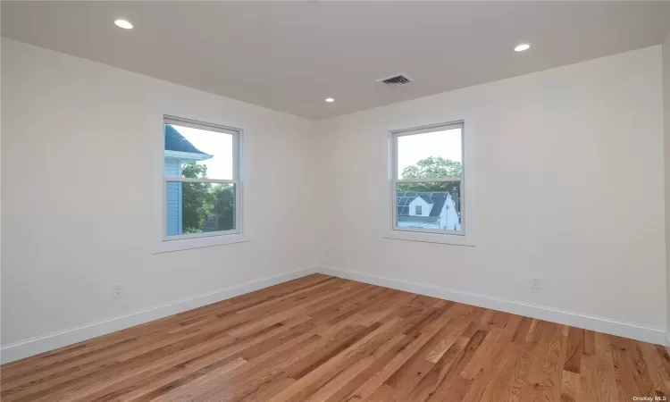 Bedroom with hardwood floors