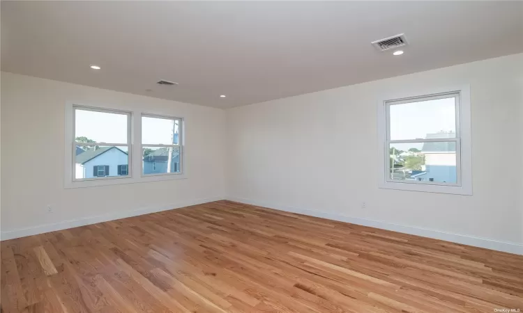 Bedroom with hardwood floors