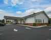 View of building exterior with a carport