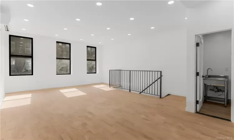 Spare room with light hardwood / wood-style flooring