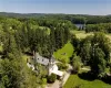 Birds eye view of property featuring a rural view