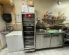 Kitchen featuring sink and light tile patterned floors