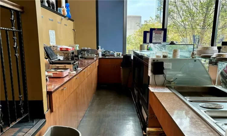 Kitchen featuring dark hardwood / wood-style flooring