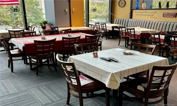 Dining area featuring carpet