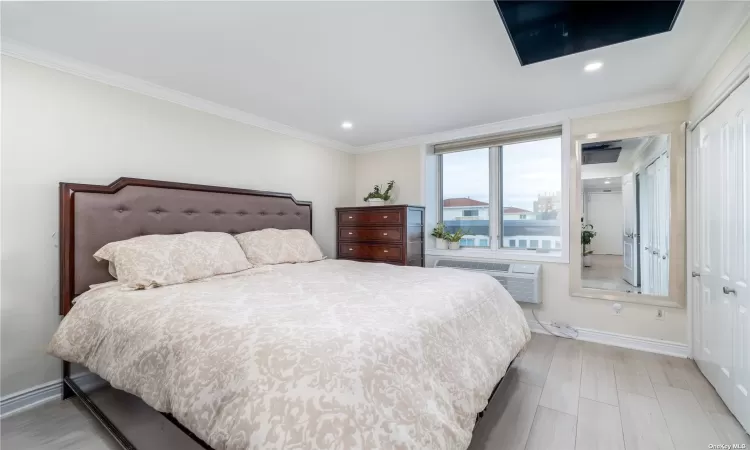 Primary Bedroom with Closet and Ocean Views from Window