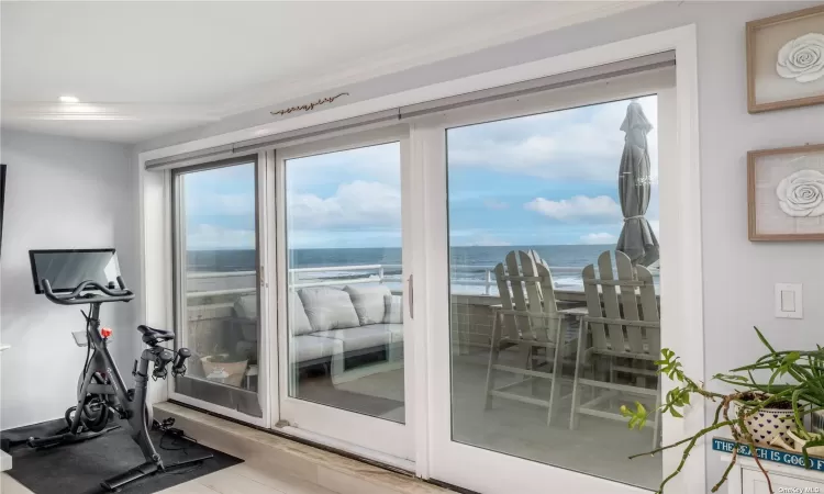 Kitchen/Living Room Overlooking The Ocean through Oversized Sliding Door