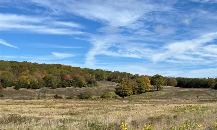 View of mountain feature with a rural view