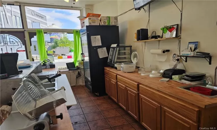 Tiled office with sink