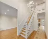 Two Story entry Hallway with double Coat Closet