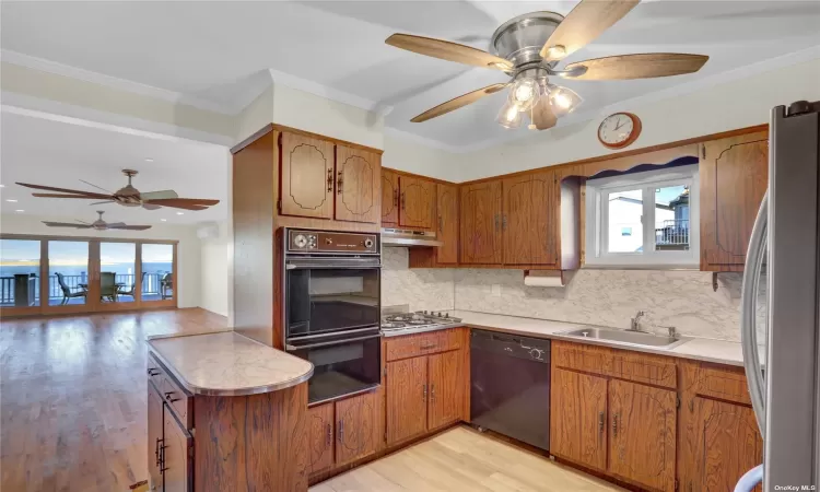 living room virtually staged with elevator in foyer