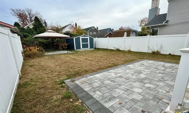 Large Yard w/ 2 New Patios & Shed