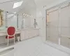 PRIMARY BATHROOM WITH TWO SINKS AND SHOWER