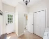 Dining area with a baseboard radiator, indoor bar, and dark wood-type flooring